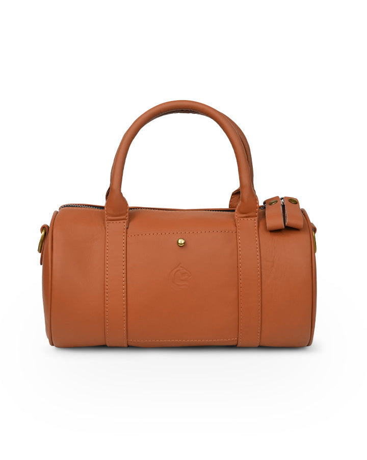A brown leather duffel handbag with two handles and a detachable crossbody strap.