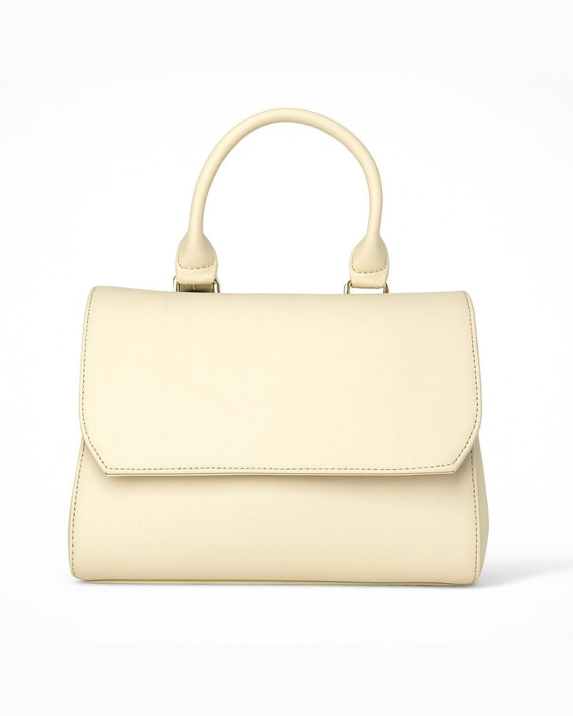 Cream-colored handbag on a light gray background