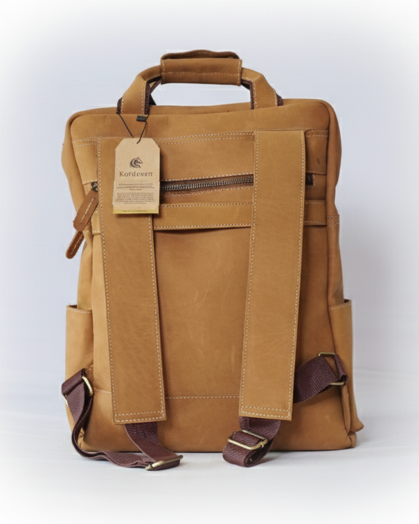 Camel backpack with a tag on a white background