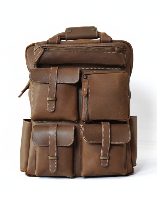 Brown leather backpack on a white background