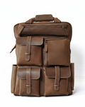 Brown leather backpack on a white background