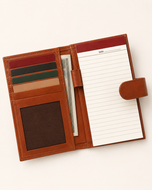 The Armour wallet open — phone slots, card slots, ID window and notepad pocket