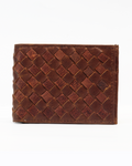 A brown, distressed leather bi-fold wallet with a woven pattern on the exterior.