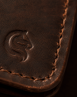 Close-up of the waxed, distressed Crazy Horse leather grain on the Bronco wallet