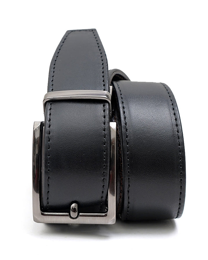 A reversible belt with a black and brown color scheme, featuring a smooth nappa leather surface and a gunmetal-tone buckle.