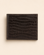 The Gator croc-texture bifold wallet in brown leather — front view | Kordovan Pakistan