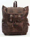 A distressed brown leather backpack with adjustable shoulder straps, two side zippered pockets, and a front pocket with flap cover. The backpack is displayed against a white background.