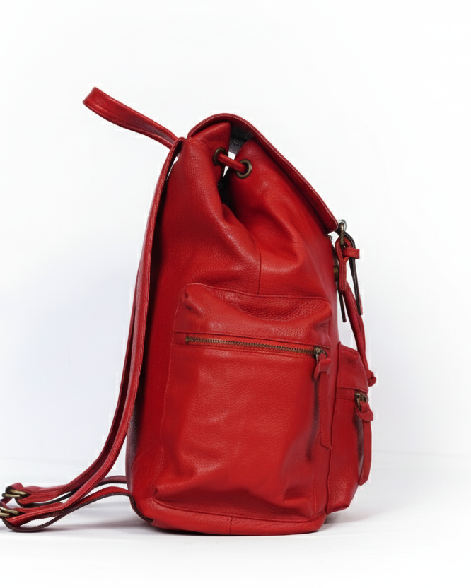 Red leather backpack on a white background