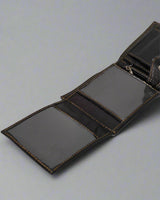 Sheppard wallet button pocket open — soft sheep leather detail