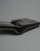 Close-up of the soft sheep leather grain on the Sheppard wallet