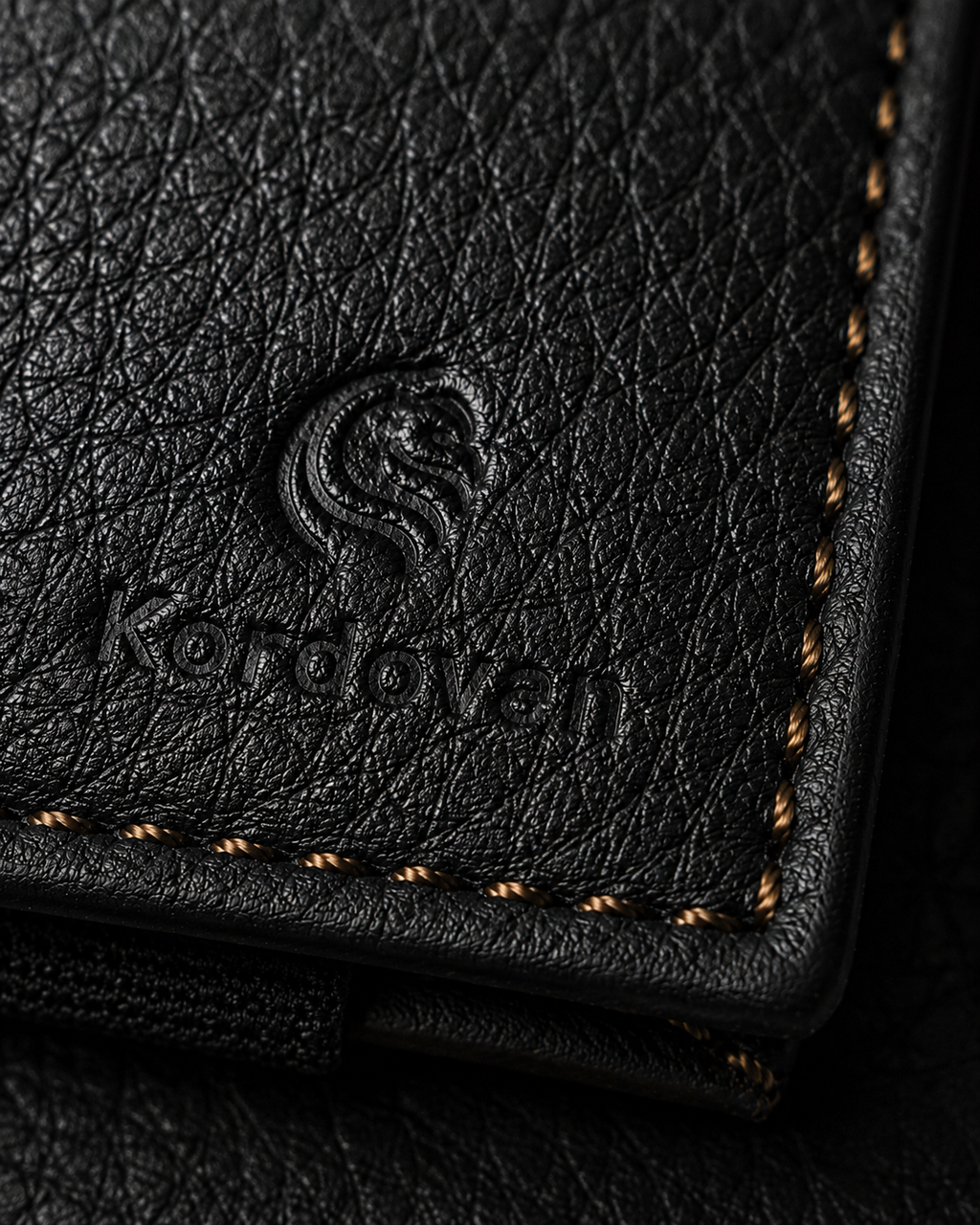 Close-up of the black milled cow leather on the ILLUSION magic wallet