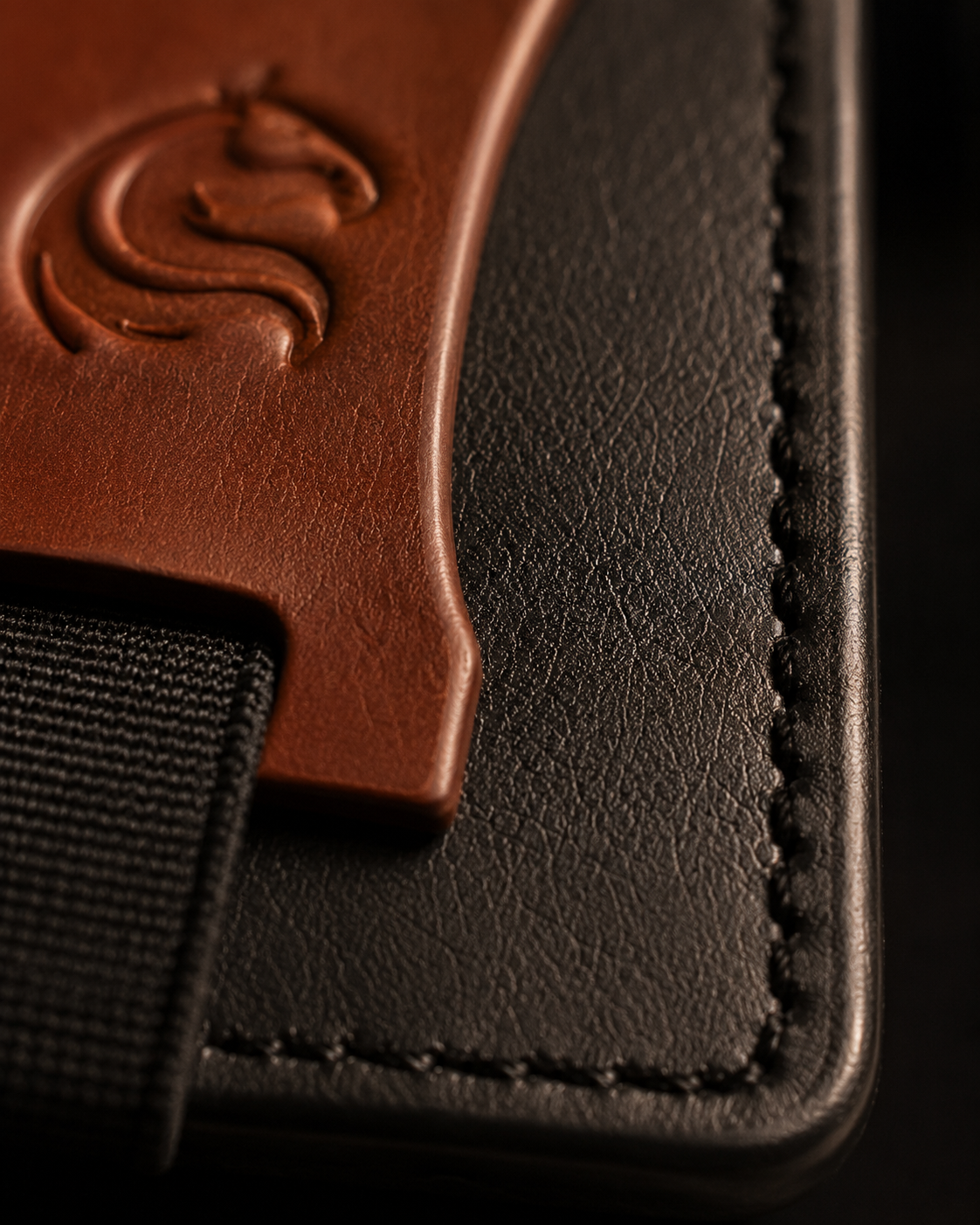 Close-up of the premium leather on the black and brown Razor wallet