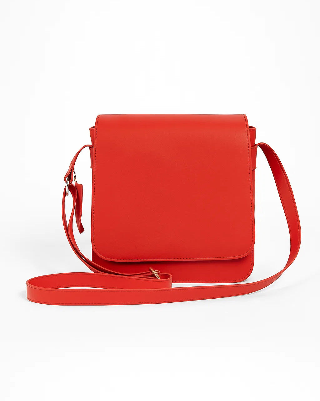 Red crossbody bag on a white background