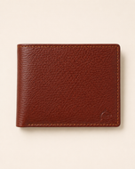 The Kingsman pebble-grain leather bifold wallet in light brown — front view | Kordovan Pakistan