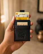 Black Kodo Vertical 2.0 slim RFID wallet held in hand for scale
