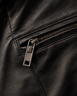 Legender Black — men's black belted leather jacket, close-up of the leather grain and belt | Kordovan Pakistan