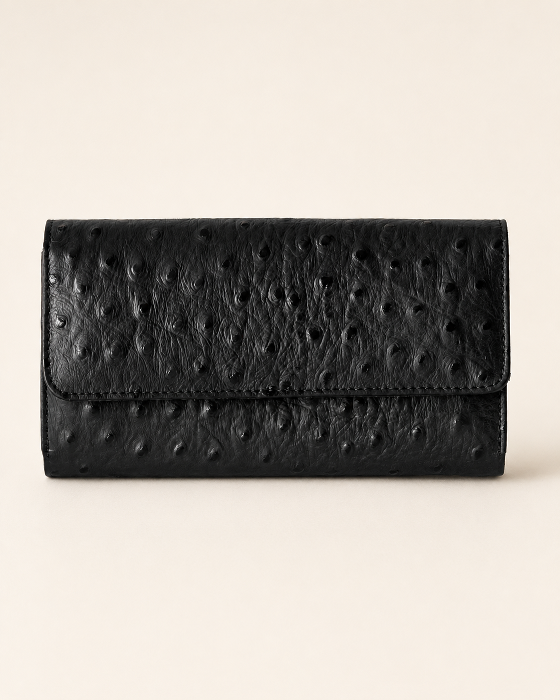 Luxurious ladies clutch wallet in black ostrich-pattern leather — front view | Kordovan Pakistan