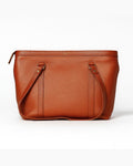 Tan leather handbag on a white background