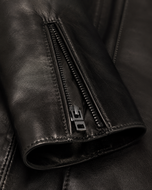 Marc Ed — men's black sheepskin leather jacket, close-up of the leather grain and hardware | Kordovan Pakistan
