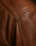 Maverick — men's brown sheepskin leather jacket, close-up of the leather grain and hardware | Kordovan Pakistan