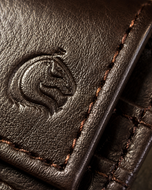 Mocha Mate wallet back — outer button-closure coin pocket in brown leather