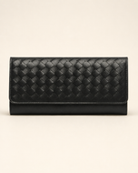 The Nova handwoven leather clutch wallet in black — front view | Kordovan Pakistan