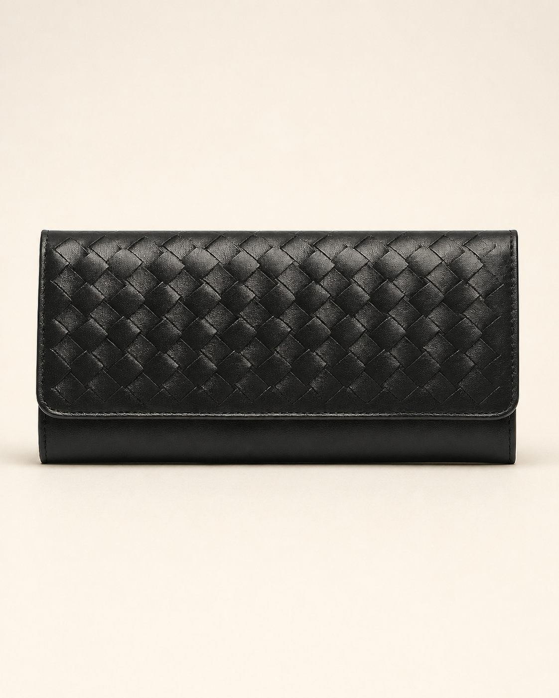 The Nova handwoven leather clutch wallet in black — front view | Kordovan Pakistan