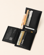 Black plain bifold wallet open — card slots, ID window and cash compartment