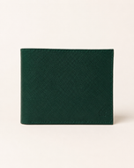 Premium saffiano leather wallet in emerald green — front view with logo plaque | Kordovan