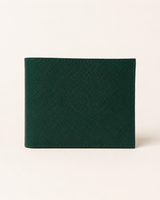 Premium saffiano leather wallet in emerald green — front view with logo plaque | Kordovan