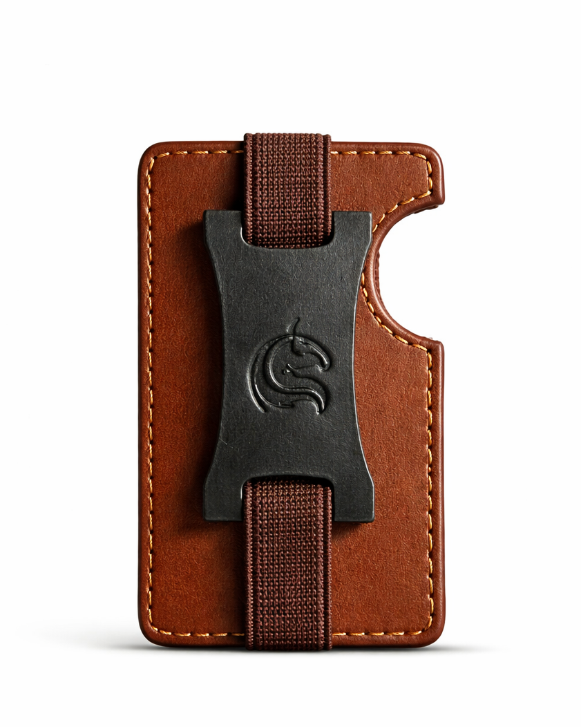 Brown leather cardholder with black metal clip on a white background