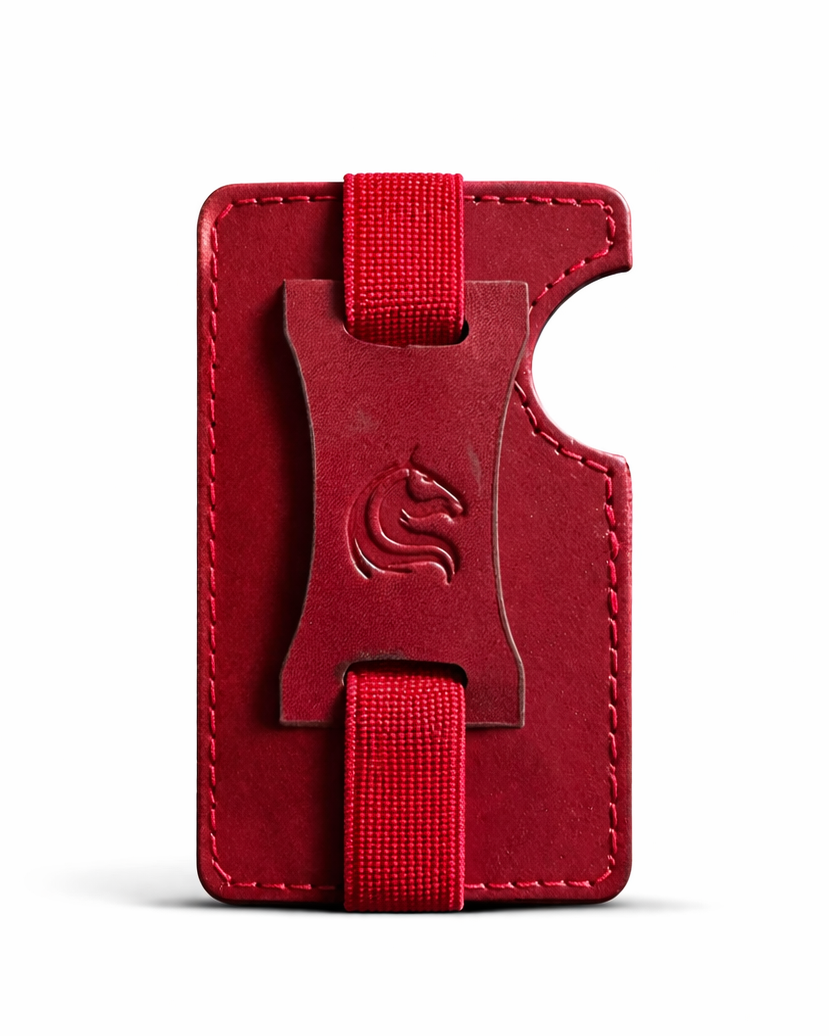 Red wallet with a strap on a white background