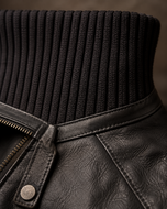 Reacher — men's black ribbed-collar leather jacket, close-up of the leather grain and hardware | Kordovan Pakistan