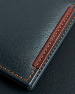Close-up of the soft milled leather texture on the Thomas wallet
