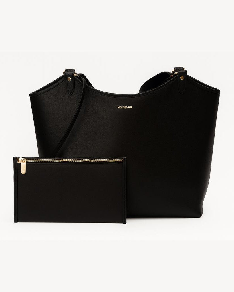 Black handbag and matching pouch on a white background