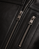 Stryker — men's black zip-detail leather jacket, close-up of the leather grain and hardware | Kordovan Pakistan