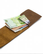 The Luke minimalist wallet holding cards and bills — vertical billfold capacity