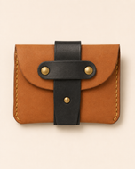 The Hunter HM rugged leather wallet with brass-studded strap — front view | Kordovan Pakistan