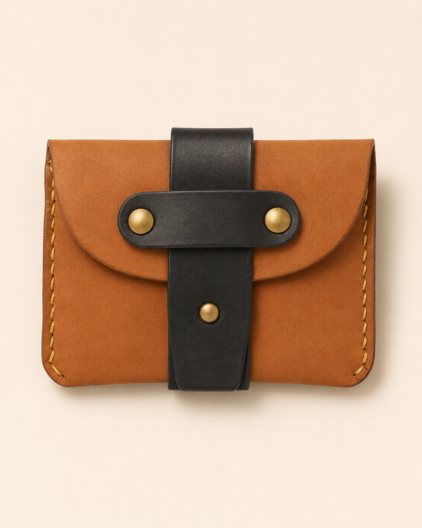 The Hunter HM rugged leather wallet with brass-studded strap — front view | Kordovan Pakistan