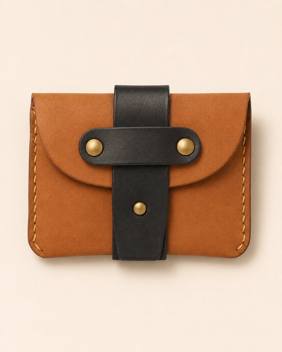 The Hunter HM rugged leather wallet with brass-studded strap — front view | Kordovan Pakistan