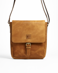 Brown leather crossbody bag on a white background