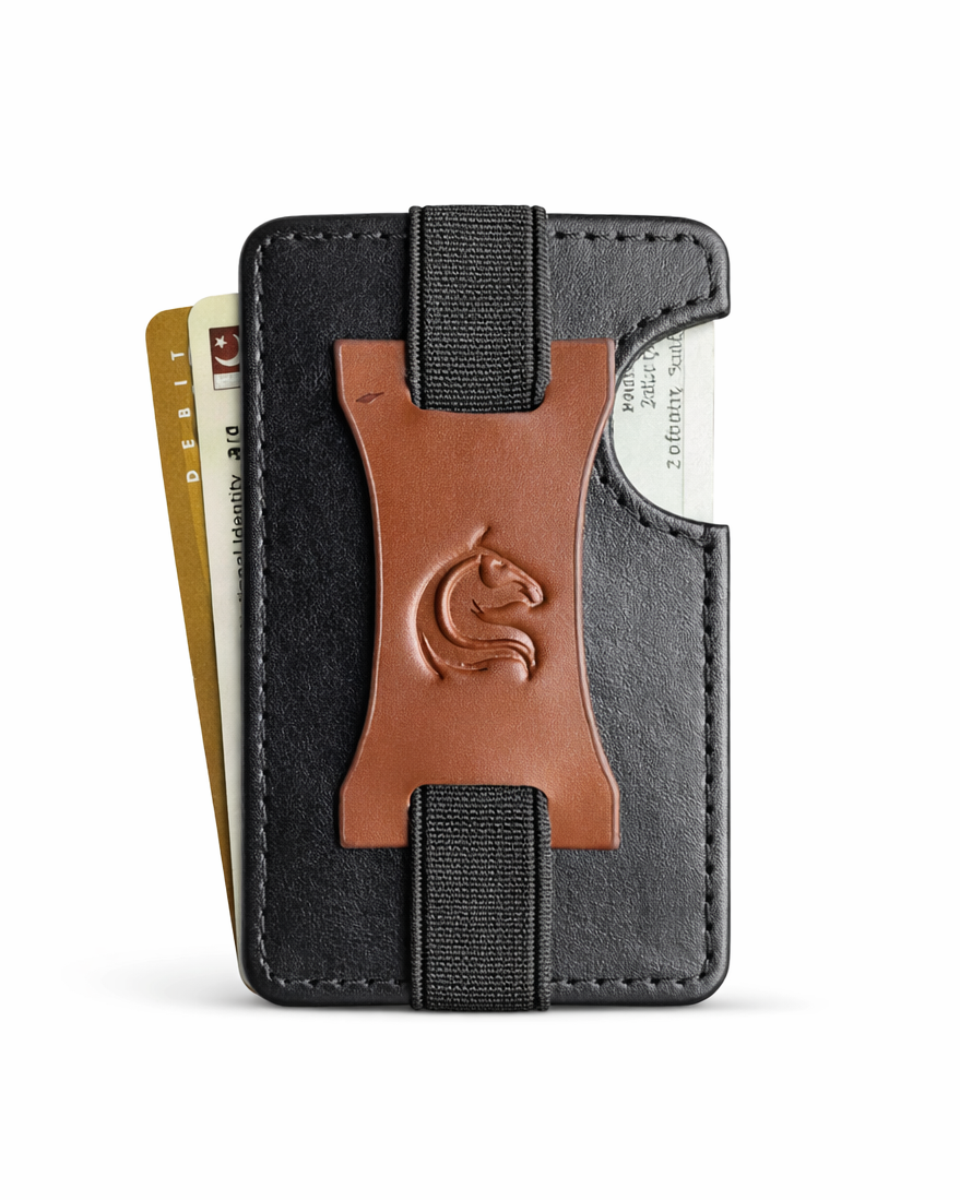 Black wallet with a brown leather patch on a white background