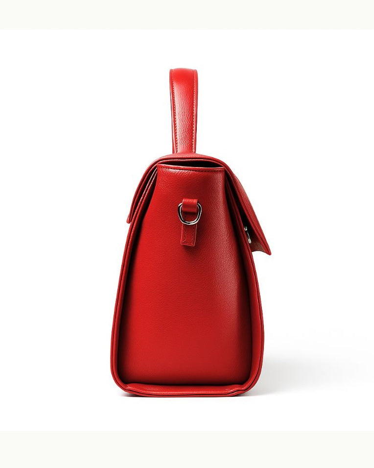 Red handbag on a white background