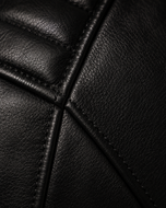 Vanguard — men's black leather biker jacket, close-up of the asymmetric zip and leather grain | Kordovan Pakistan