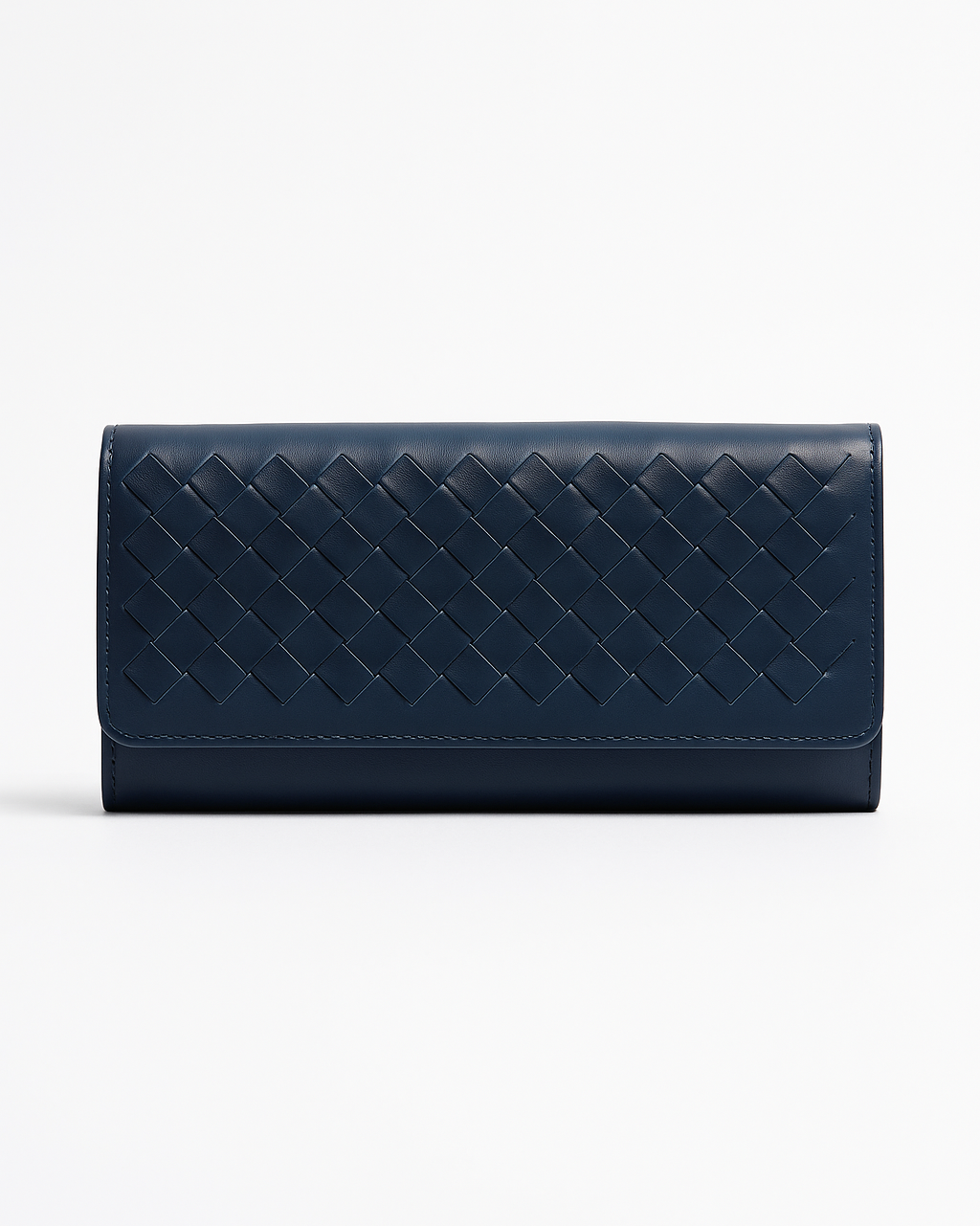Navy blue quilted clutch bag on a white background