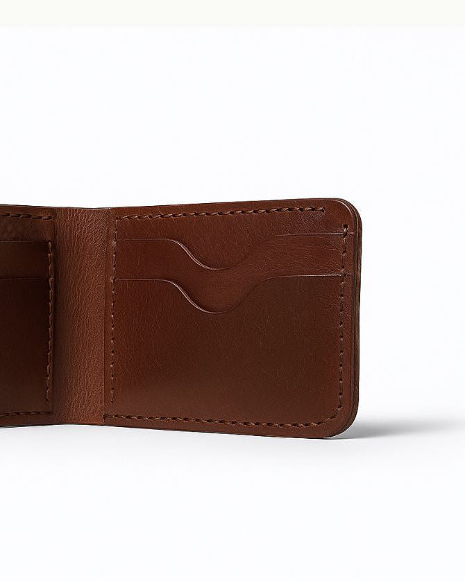 Brown leather wallet on a white background